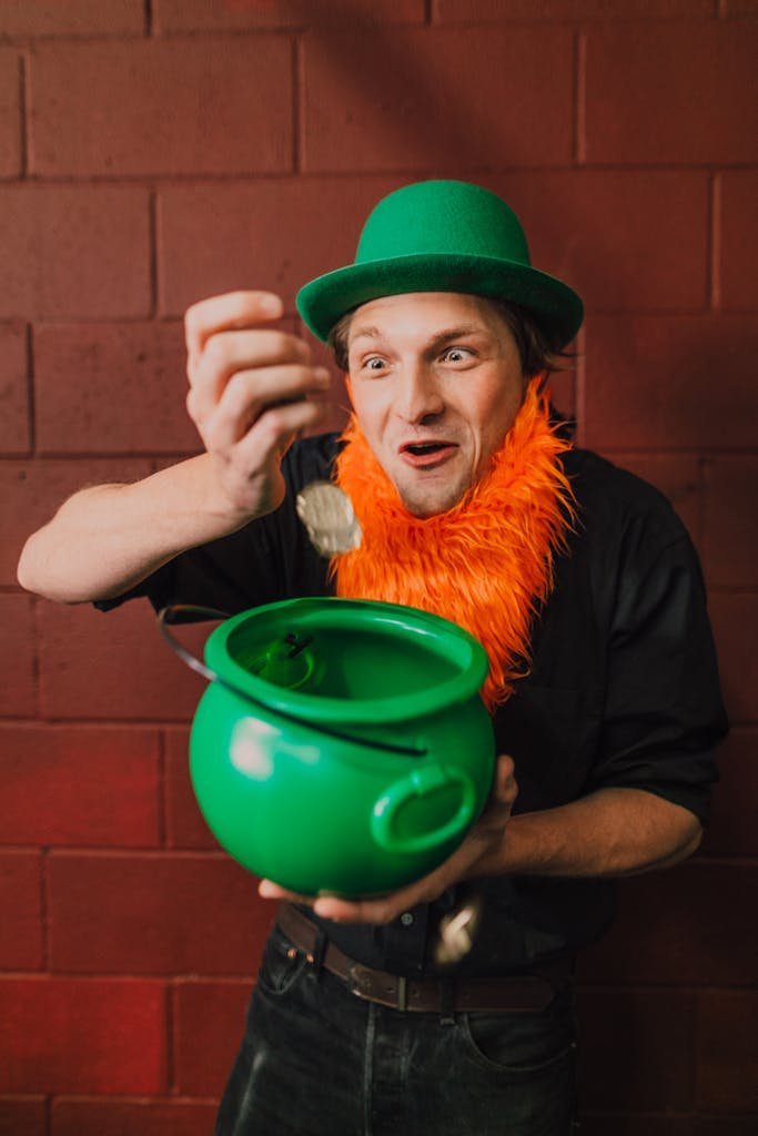 Man in leprechaun costume holding a green pot indoors, representing muscle building myths for an article called mhy is muscle building so confusing?